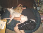 Stu and 2 dogs sharing a nap